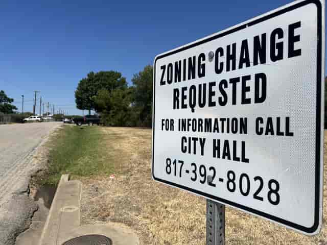 Zoning change sign at The Ashton Depot for future event venue development.