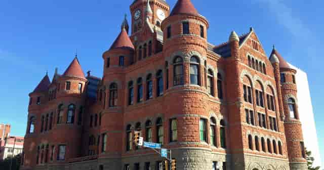 Historic Dallas Jail with clock tower, ideal for events and meetings.