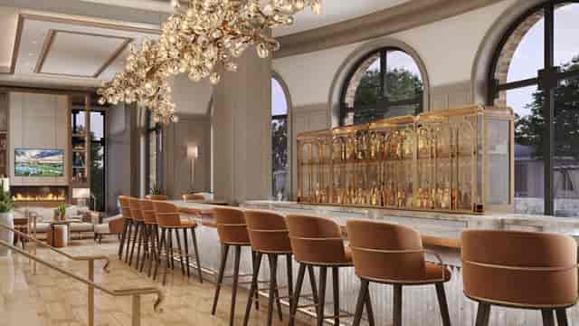 Elegant bar area at The Ritz-Carlton Dallas, ideal for networking events.