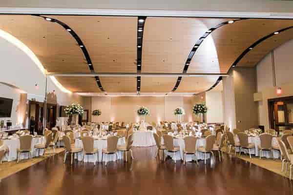 Elegant wedding hall with floral centerpieces at Marriott Dallas/Fort Worth.