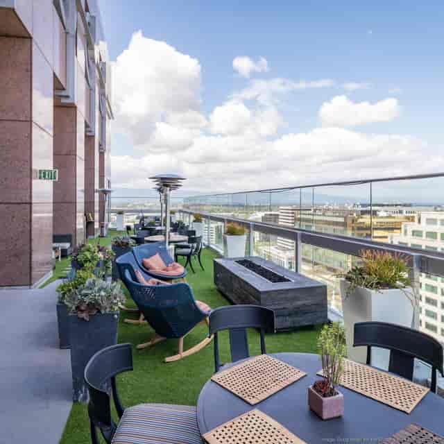 Rooftop terrace in Silicon Valley with fire pit, ideal for upscale events and gatherings.