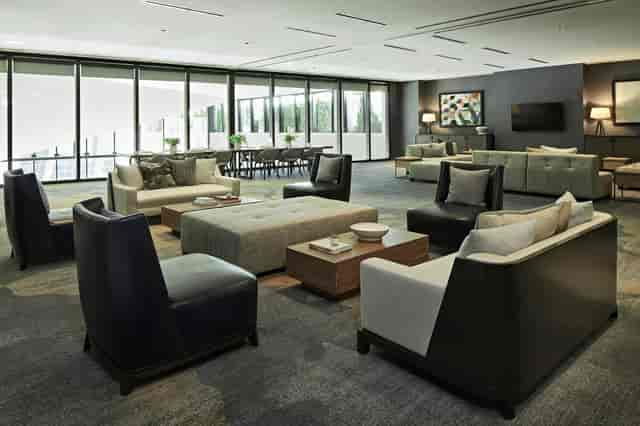 Sycamore Ballroom I: modern meeting space with large windows for corporate events.