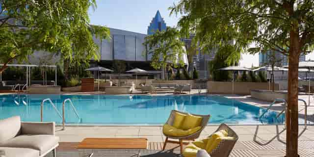 "Revival Lounge outdoor pool at Kimpton Sawyer Hotel, ideal for networking events and meetings."