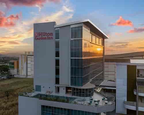 Meeting room with large windows at Hilton Garden Inn San Jose for events and conferences.