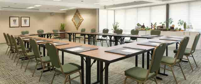 Conference room at DoubleTree San Jose with U-shaped tables for professional gatherings.