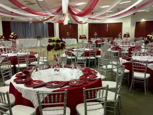Elegant banquet room with floral centerpieces, ideal for formal receptions and celebrations.