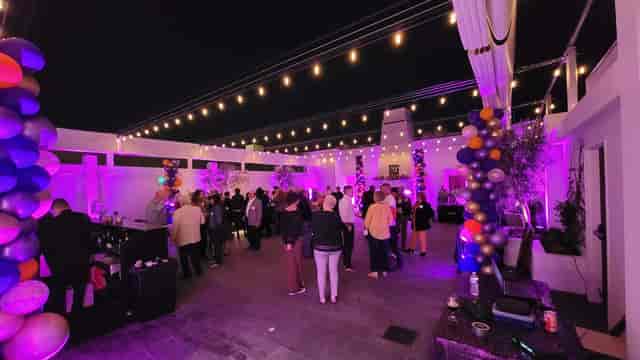 Vibrant outdoor event space with string lights at Blanco Urban Venue for festive celebrations.