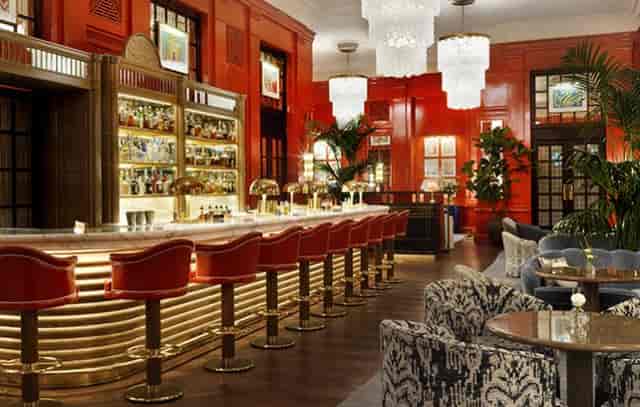 Sophisticated bar area at Small Plates restaurant, ideal for cocktail receptions and networking.