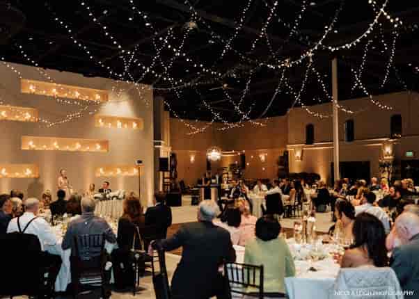 Elegant ballroom at Palm Event Center, ideal for weddings and galas, featuring enchanting lighting.