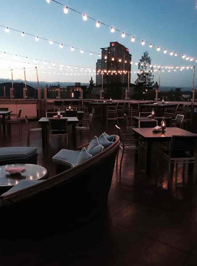 Rooftop patio at Scott's Seafood, perfect for evening events with scenic views.
