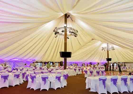 Tree Tops Pavilion event tent with elegant tables, perfect for weddings and gatherings.