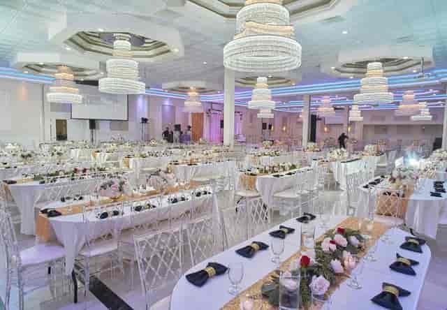 Elegant Grand Ballroom at Oasis Palace, ideal for weddings and events with chandeliers.