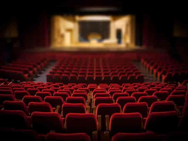Support Spaces auditorium with plush red seating, ideal for performances and events in Mountain View.