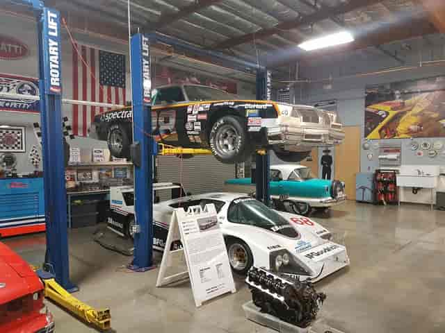 Patio at Club Auto Sport: vintage cars showcase for automotive events and social gatherings.