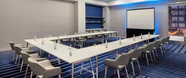 U-shaped meeting room in San Jose Convention Center for workshops and strategic meetings.