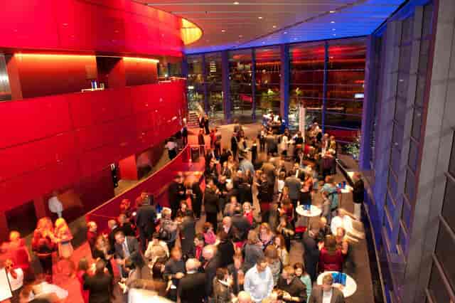 Vibrant networking event at Skyline Terrace, Winspear Opera House, with elegant seating.