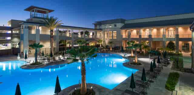 Presidents Room at The Briar Club with illuminated pool for outdoor events and receptions.