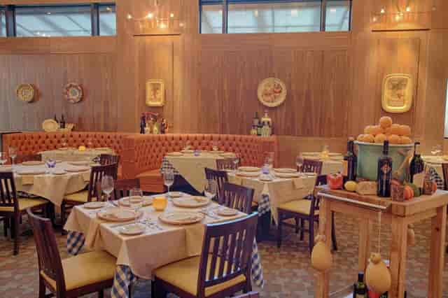 Private dining room at Ciao Bello with warm lighting for intimate gatherings and events.