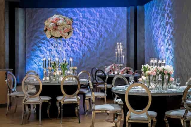 Elegant event space in Aloft Dallas, warm lighting for upscale weddings and corporate events.