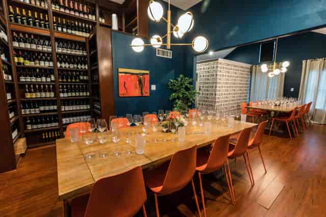 Elegant private dining room with wooden table, perfect for intimate events and meetings.