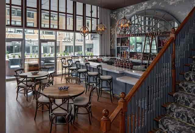 Stylish Hilton Garden Inn suite with elegant bar, perfect for meetings and events.