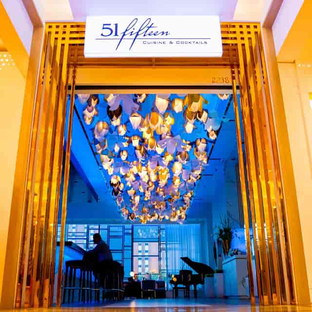 Main dining room at 51fifteen, vibrant lighting for corporate events and celebrations.