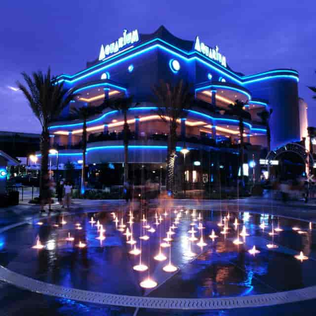 Vibrant family restaurant with blue lighting, ideal for events and receptions in Downtown Aquarium.