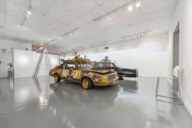 Art Car Museum exhibition gallery with vintage cars, ideal for immersive theme events.