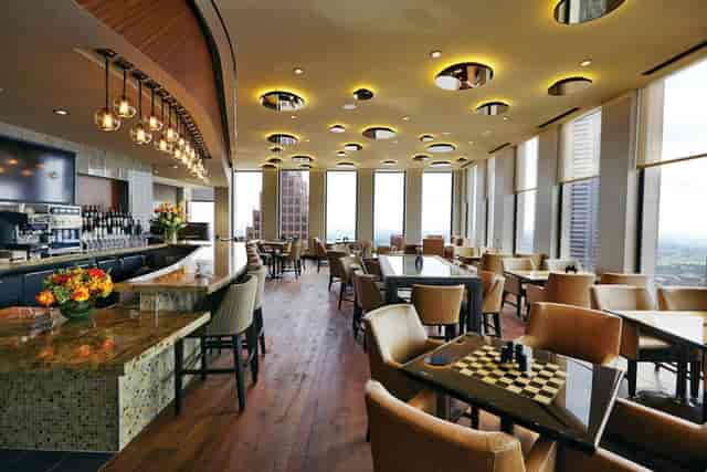 Power Boardroom at Houston Club: modern venue with expansive windows for meetings or receptions.