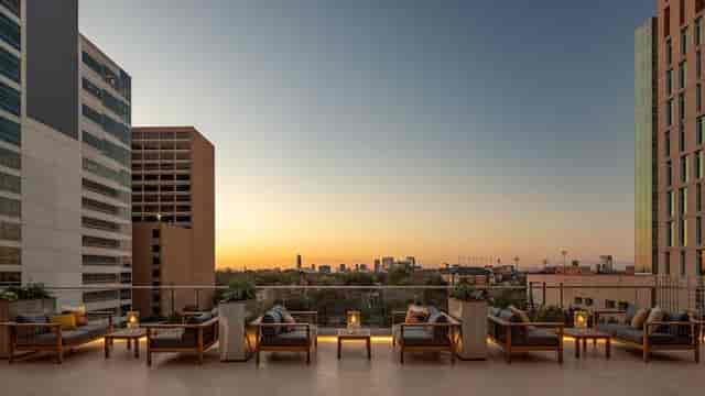 Stylish rooftop terrace with sunset view, perfect for cocktail receptions and networking events.