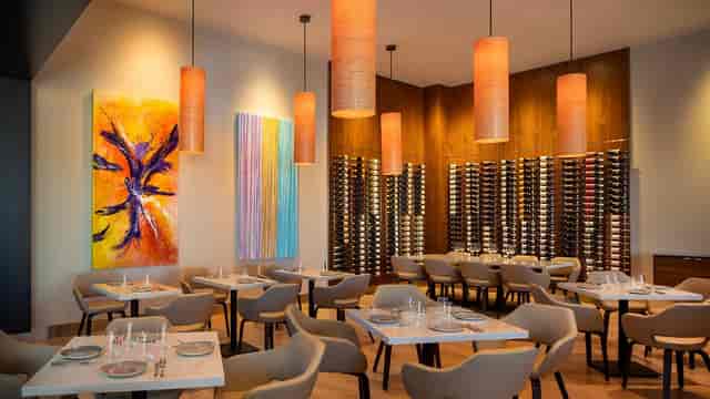 Stylish Terrace 54 restaurant with warm lighting, perfect for networking lunches or events.