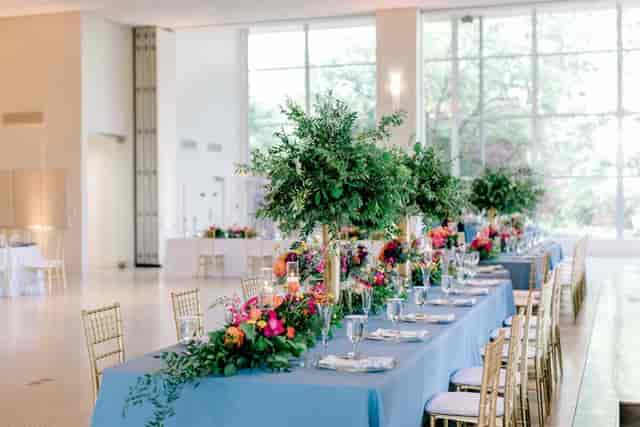 Elegant Grand Hall with floral decor, perfect for corporate and social events.