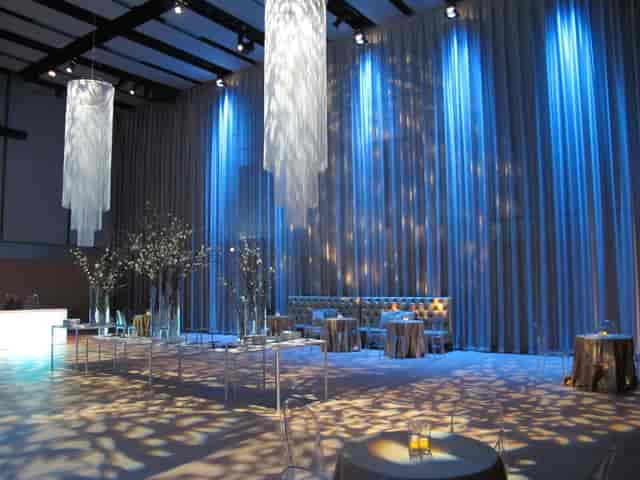 Elegant Hamon Hall with blue lighting, perfect for high-end cocktail parties and galas.
