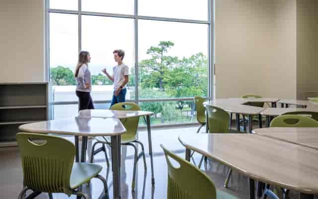 Modern Houston cafeteria with flexible seating for workshops and gatherings.