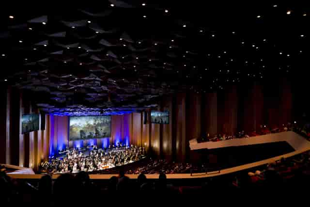 Houston Symphony auditorium with audience enjoying a concert in a grand setting.