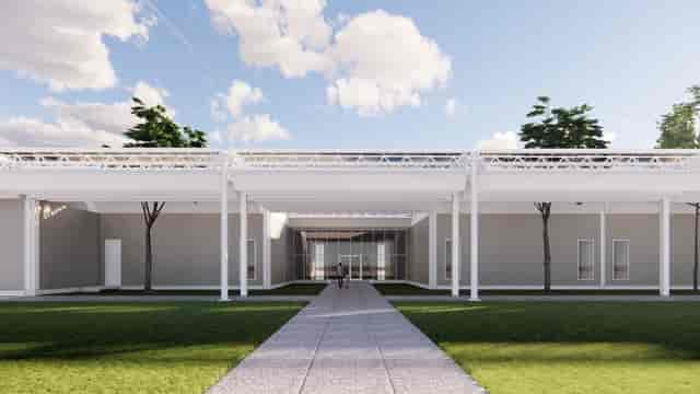Modern event venue at Menil Collection with inviting entrance and lush greenery.