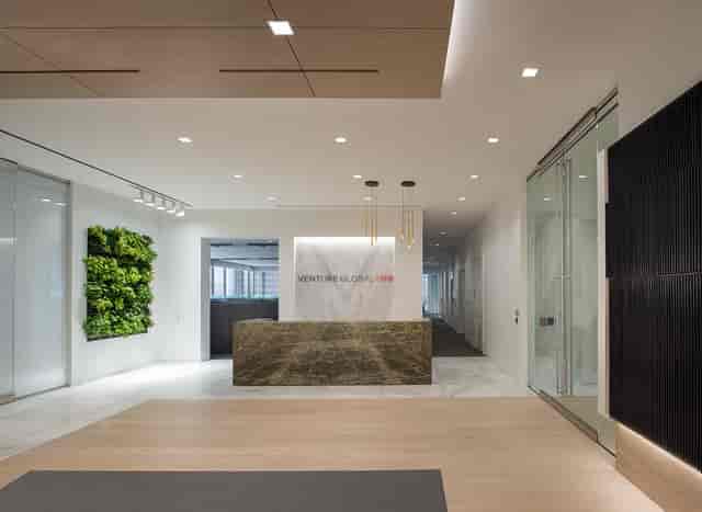 Modern reception area in Houston corporate office, ideal for networking and events.