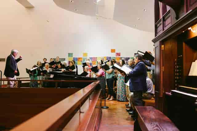Raible Chapel choir practice at First Unitarian Church, perfect for community events and performances.