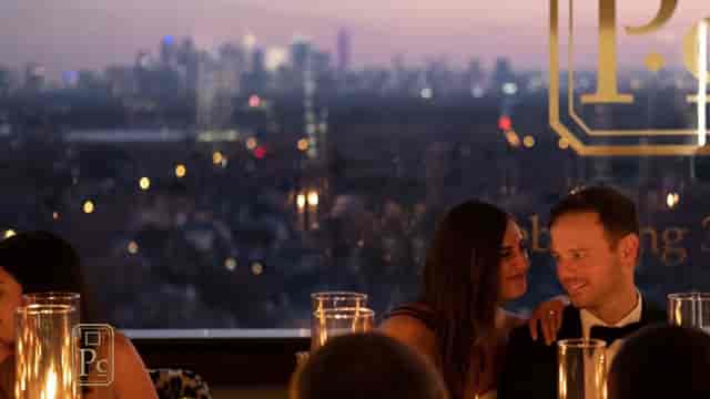 Elegant Onyx Lounge evening event with city skyline, perfect for upscale networking.