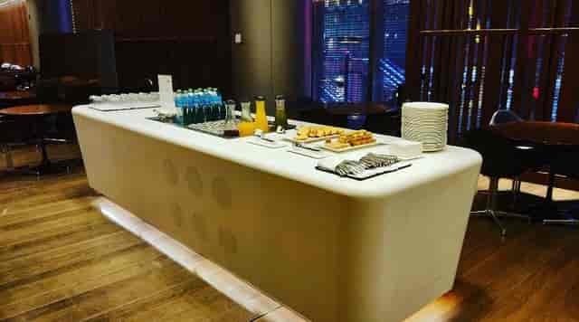 Sleek refreshment station at Onyx Lounge, ideal for professional gatherings and networking.