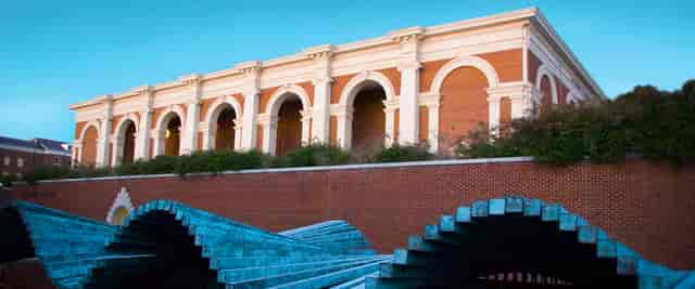 The Gates in Meadows Museum: historic venue with arched windows for events and receptions.