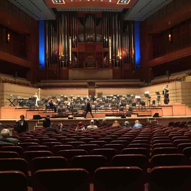 Horchow Hall concert venue with elegant lighting, ideal for orchestral performances and events.