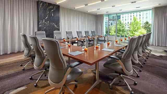 Modern conference room at The Statler with ergonomic chairs for productive meetings.