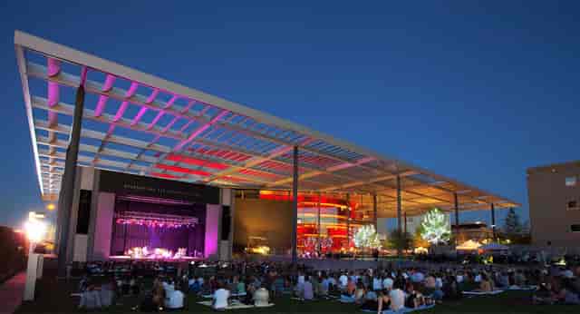 Annette Strauss Square stage with colorful lights for summer concerts and events.
