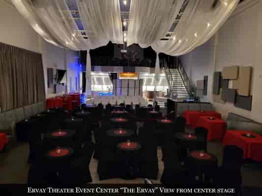 Ervay Theater event space with elegant draping, ideal for corporate gatherings and workshops.