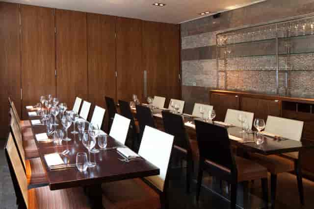 Private dining room at Mint Leaf Lounge with elegant table setup for intimate events.