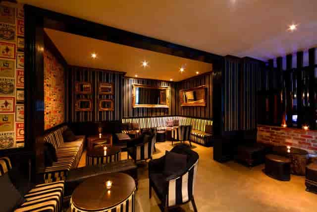Feather Lounge at The Emerald Peacock: cozy venue for networking and intimate gatherings.