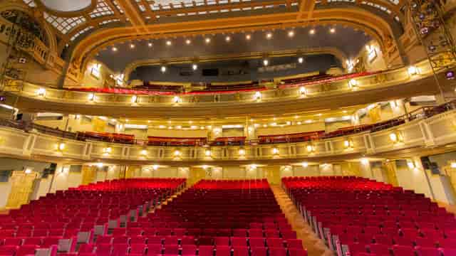 Elegant Majestic Theatre with red seats, ideal for corporate events and performances.