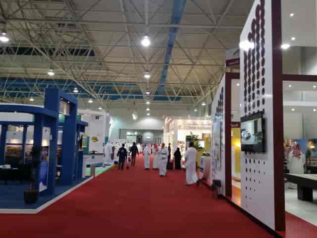 Emerald Banquet Hall at Dhahran Expo, vibrant event space with red carpet for networking.