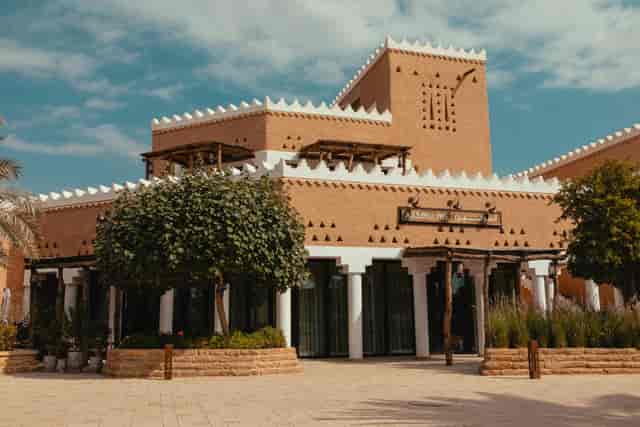 Piano bar at Bujairi Terrace, featuring traditional architecture for cultural events.